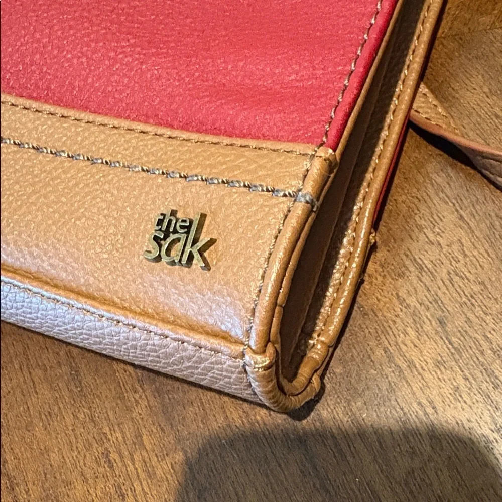 The SAK crossbody bag wristlet clutch. Pebbled Leather red/brown brass HW NWOT